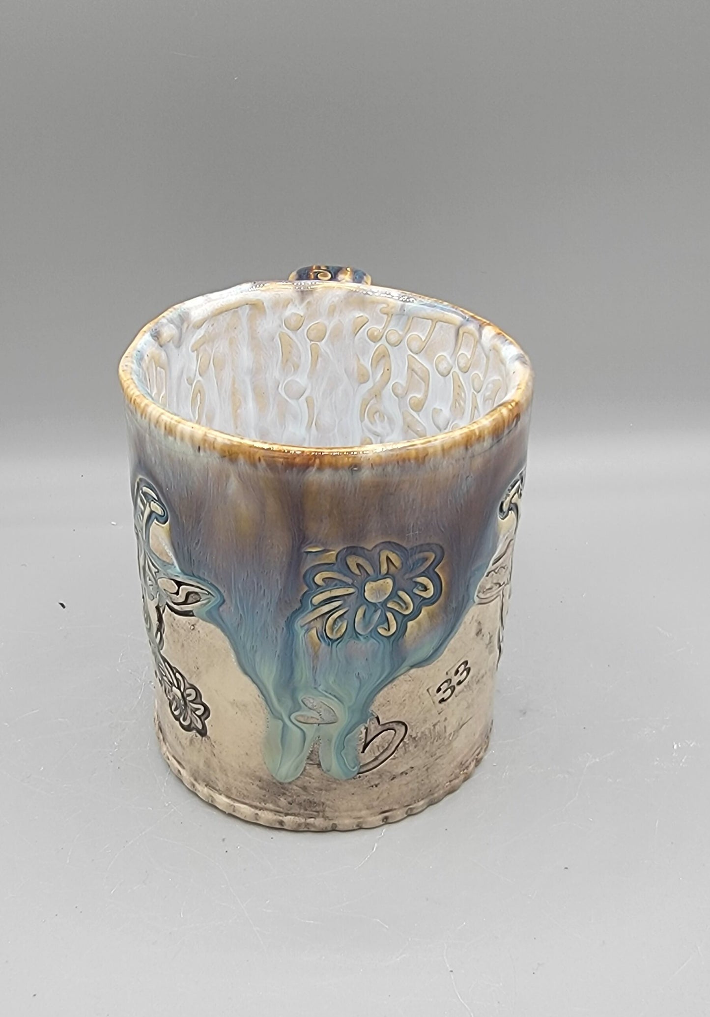 14-15oz Embossed BMFS Happy Goat Ceramic Mug in Touch of Gray With Music Notes on the Inside