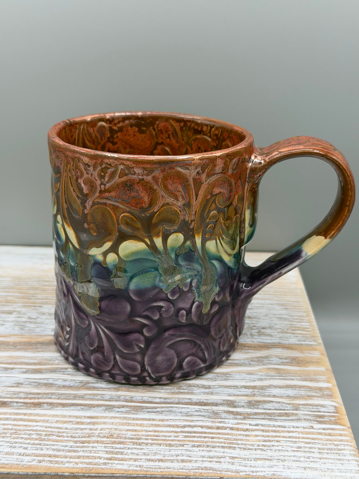 14-15 oz Embossed Paisley Ceramic Mug in Melting Copper to Purple