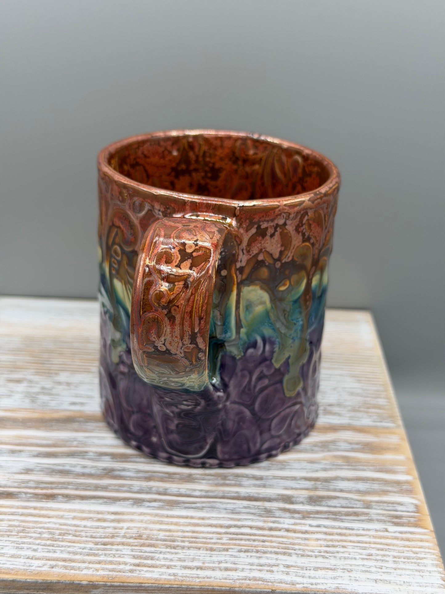 14-15 oz Embossed Paisley Ceramic Mug in Melting Copper to Purple