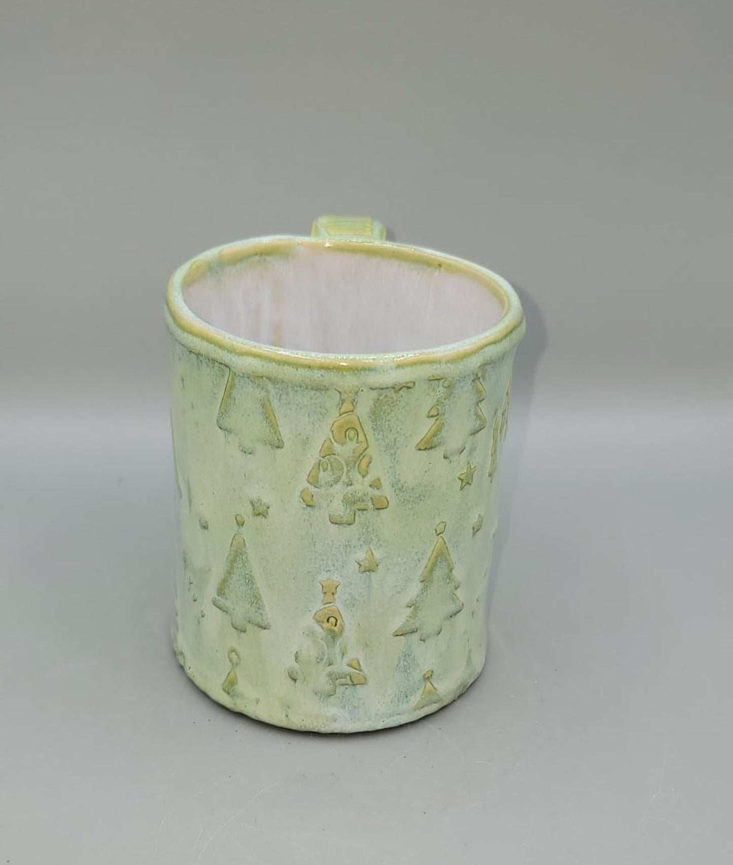 Embossed Holiday Trees Line in Mugs, Platters, Trinket Dishes and Spoon Rests