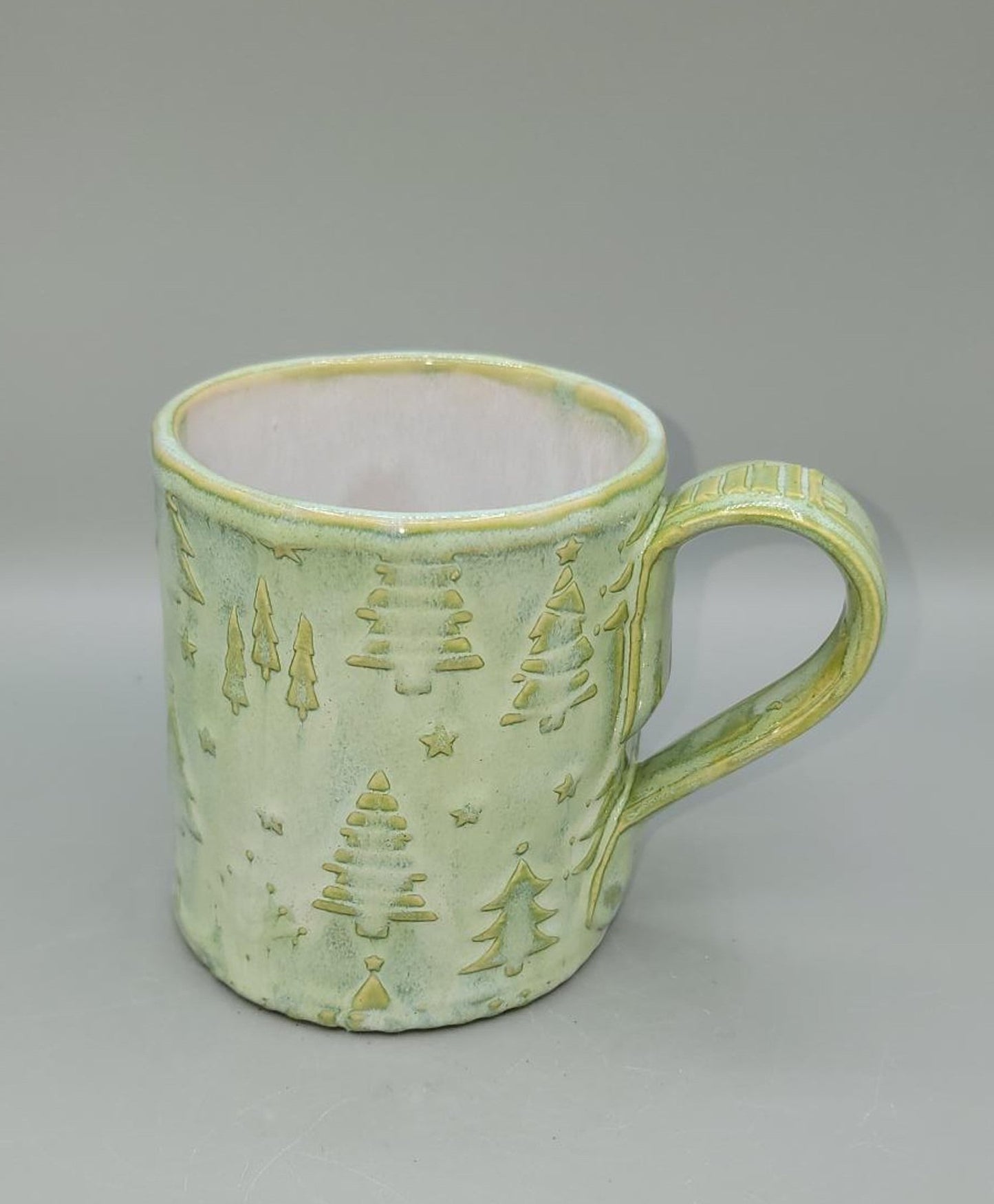 Embossed Holiday Trees Line in Mugs, Platters, Trinket Dishes and Spoon Rests