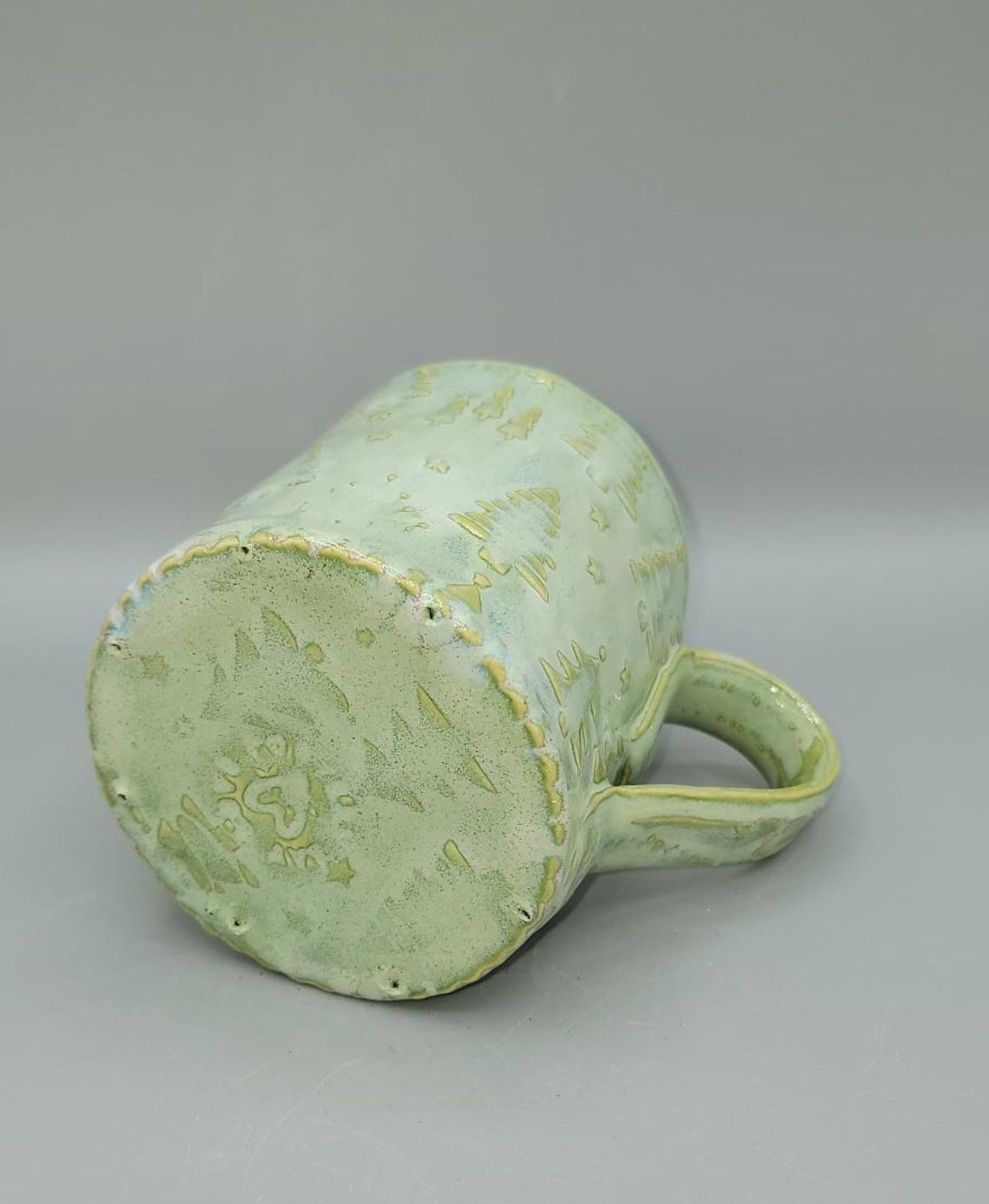 Embossed Holiday Trees Line in Mugs, Platters, Trinket Dishes and Spoon Rests