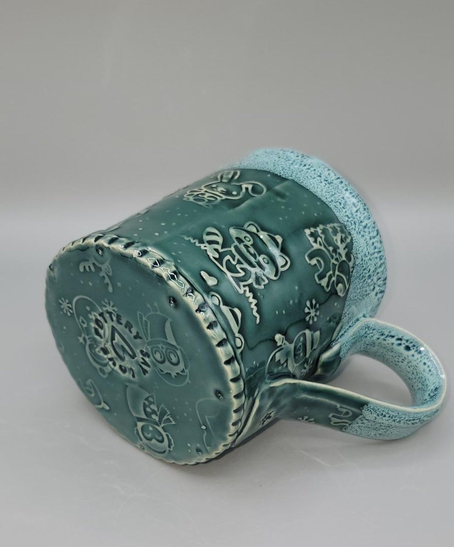 Embossed Holiday Animals Coffee Mug in Rainforest