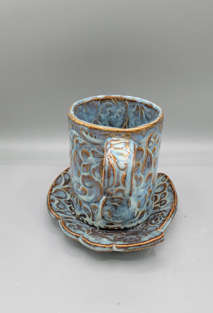 Embossed Paisley Ceramic Mug with Matching Fancy Saucer in Floating Blue