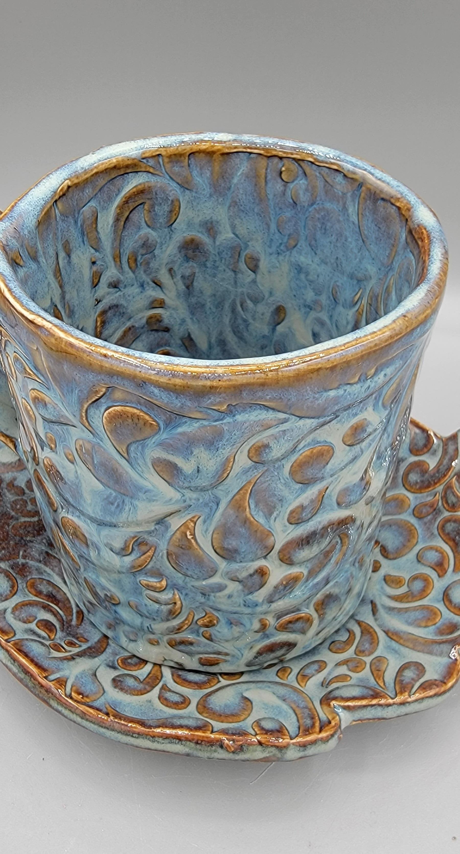 Embossed Paisley Ceramic Mug with Matching Fancy Saucer in Floating Blue