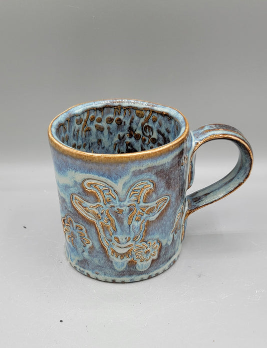 14-15oz Embossed BMFS Happy Goat Ceramic Mug in Floating Blue With Music Notes on Inside