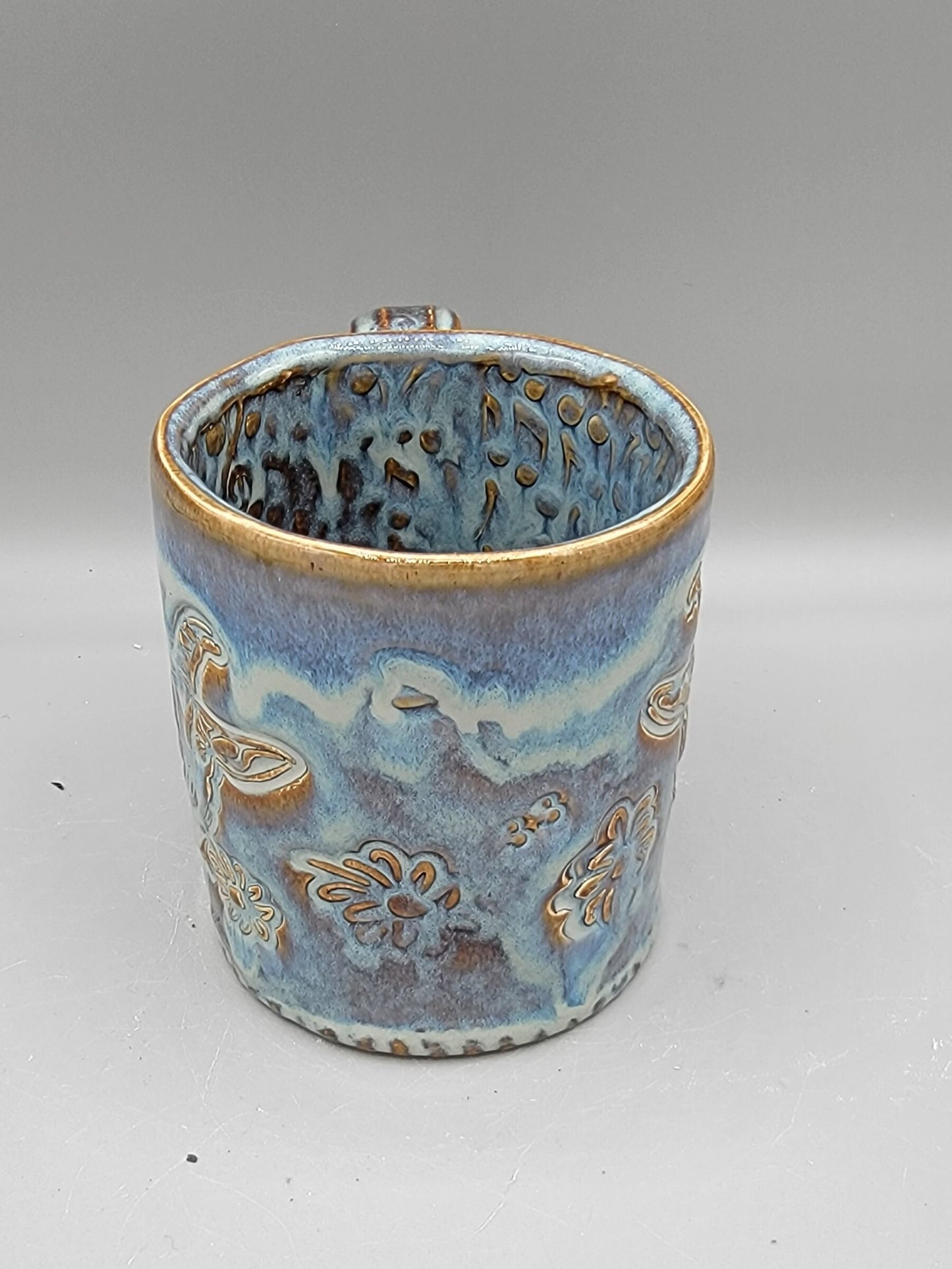 14-15oz Embossed BMFS Happy Goat Ceramic Mug in Floating Blue With Music Notes on Inside