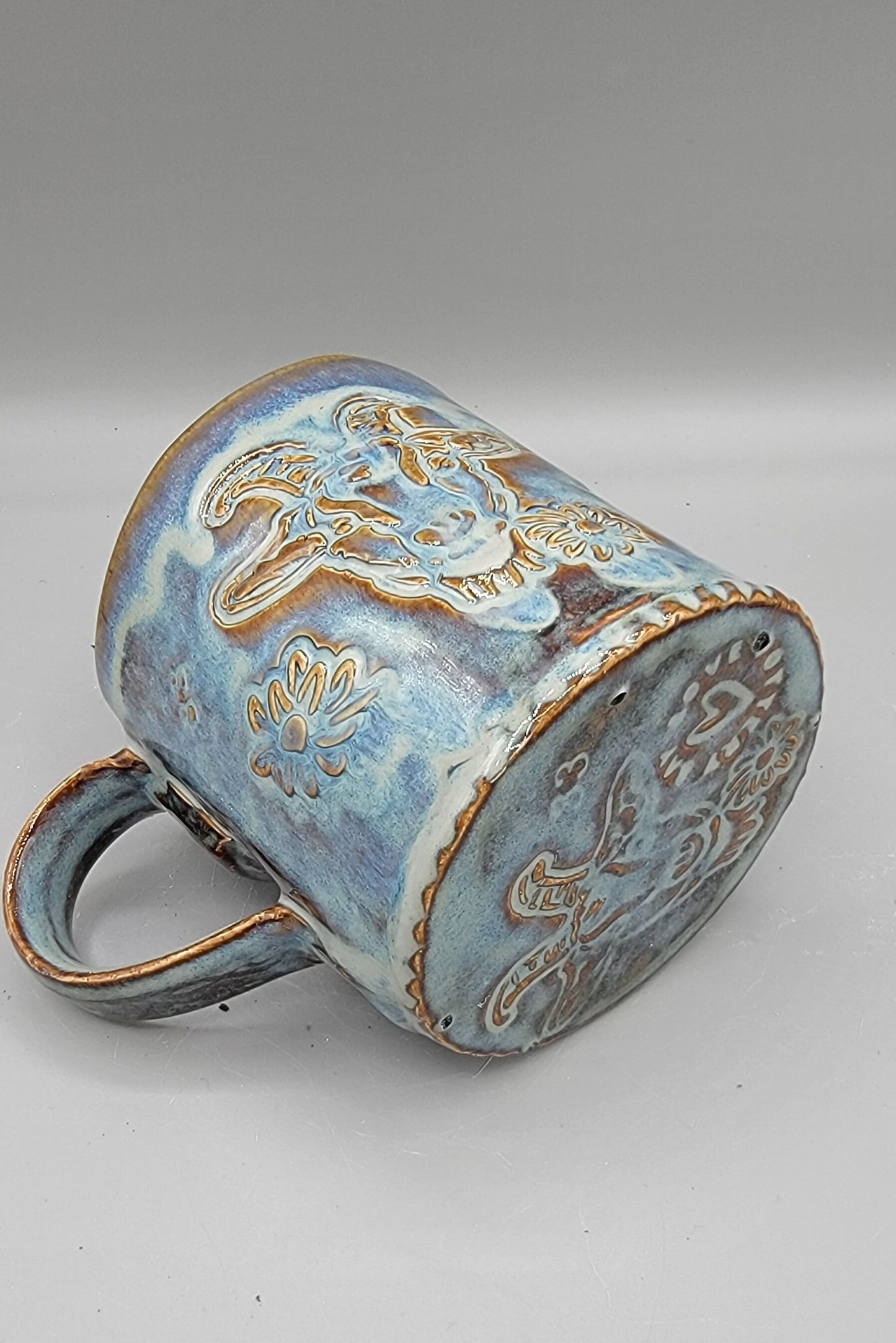 14-15oz Embossed BMFS Happy Goat Ceramic Mug in Floating Blue With Music Notes on Inside